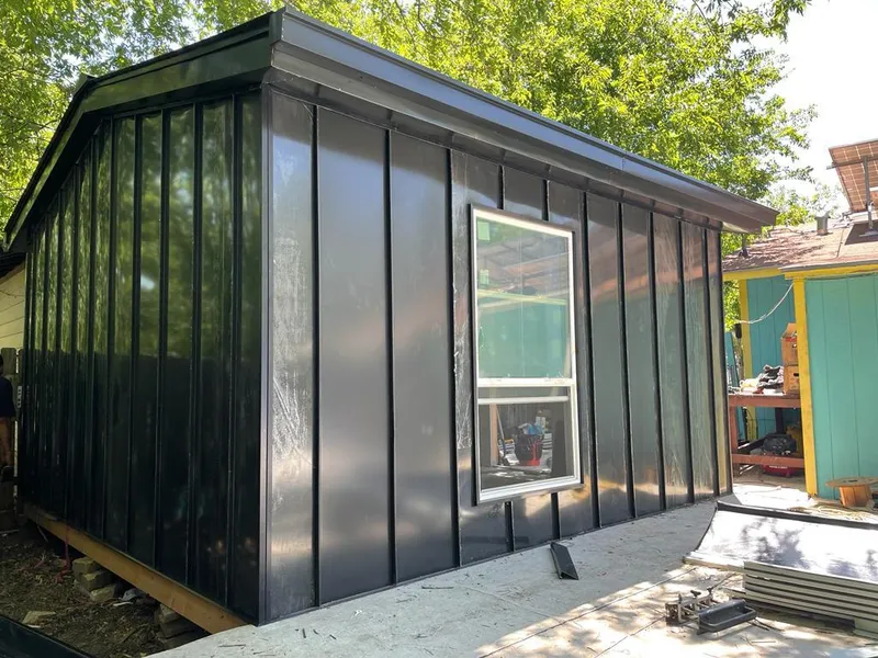 Black standing seam metal wall panels for Metal Roof Installation in Welcome